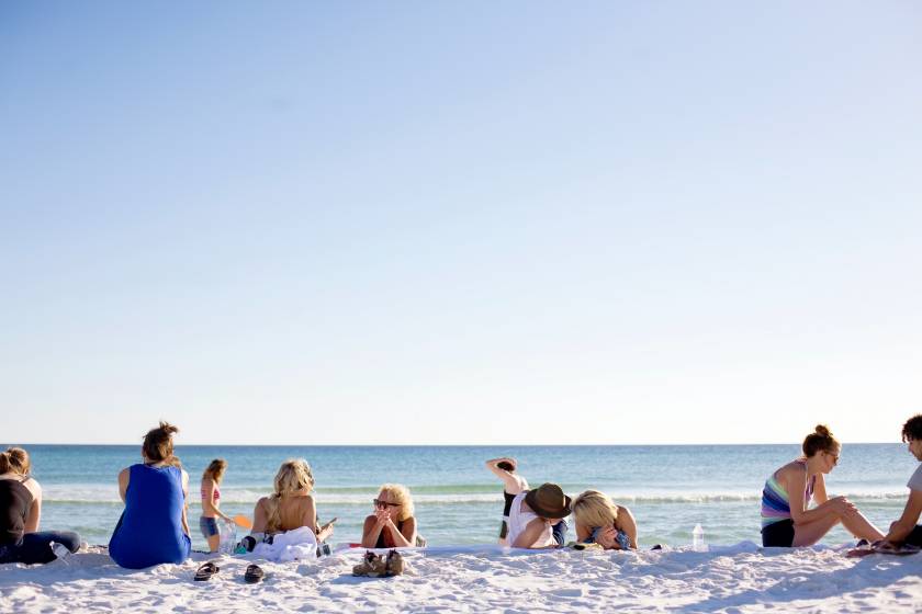 Destin Beach, Florida people hanging out on the beach, white sand